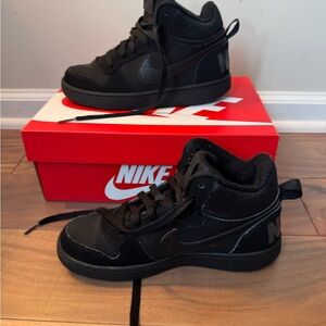 Nike Black High-Top Sneakers with Large Heel Logo